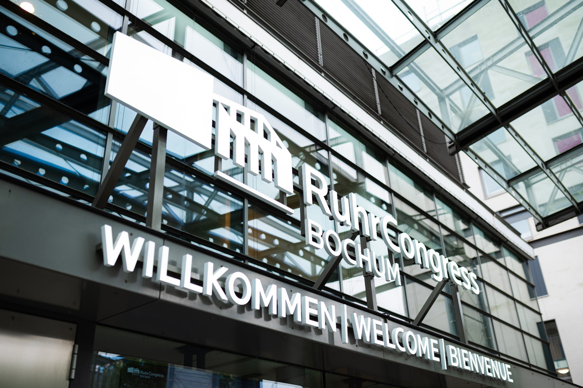 RuhrCongress Bochum entrance sign beneath the glass canopy